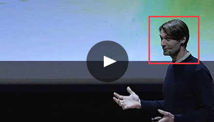 Video Thumbnail: A focused red box outlines the face of meeting presenter to demonstrate how a PTZ camera tracks a subject.